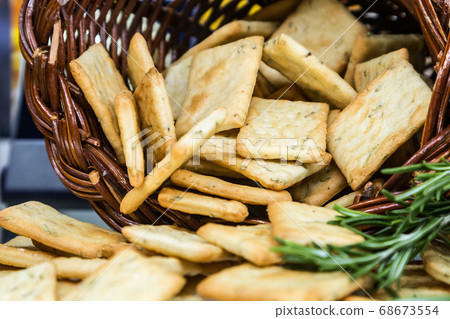 crackers with rosemary and salt are a lot 68673554