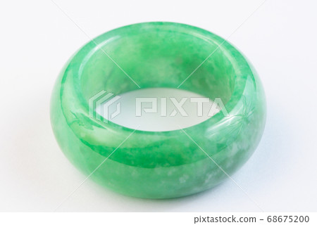 Green jade ring on white background Green jade ring on white background 68675200