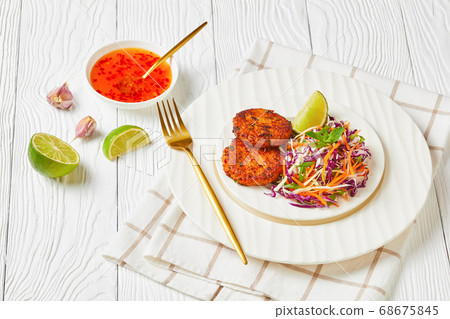 thai fish cakes served on a plate thai fish cakes served on a plate 68675845