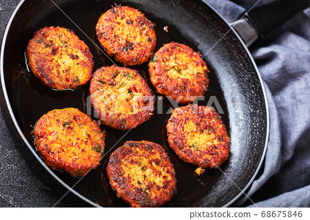 fried thai fish cakes on a skillet 68675846