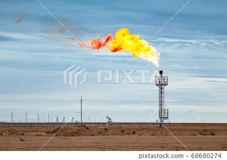 Fire on a stack of flare at oil and gas Fire on a stack of flare at oil and gas 68680274
