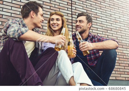 Group of young friends having fun with beer at Group of young friends having fun with beer at 68680845