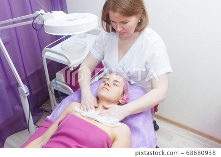 Preparation of the client for buccal massage. Preparation of the client for buccal massage. 68680938
