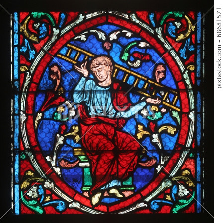 Colorful stained glass window in Notre Dame Cathedral in Paris Colorful stained glass window in Notre Dame Cathedral in Paris 68681571