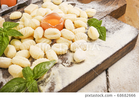 Gnocchi with potatoes. Traditional italian food from Rome, Sardinia, south of italy. Homemade Gnocchi with potatoes. Traditional italian food from Rome, Sardinia, south of italy. Homemade 68682666