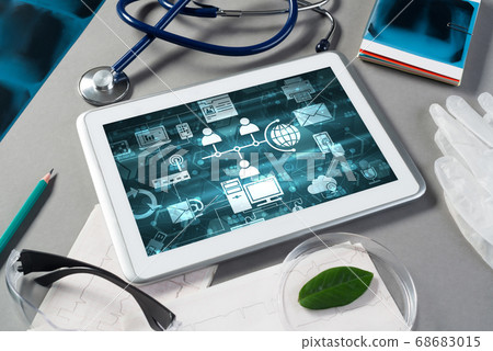 Concept of modern medicine with tablet on table from top view Concept of modern medicine with tablet on table from top view 68683015