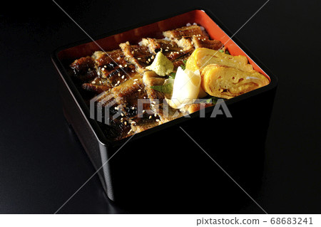 Be careful of small bones using a lot of conger eel with wasabi, gali and fried egg (black background) 68683241