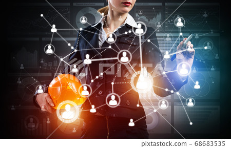 Businesswoman pointing on abstract 3d network 68683535