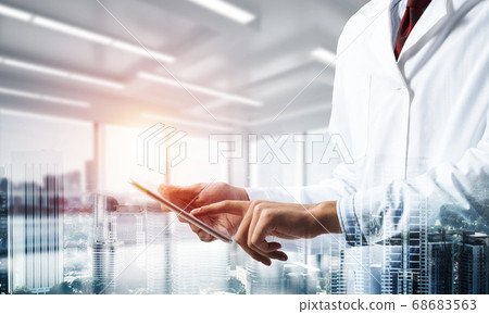 Medical industry concept by means of successful doctor Medical industry concept by means of successful doctor 68683563