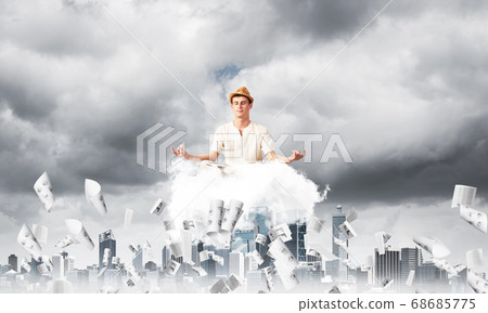 Young man keeping mind conscious. 68685775