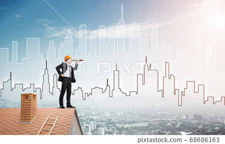 Engineer man standing on roof and looking in spyglass. Mixed media 68686163