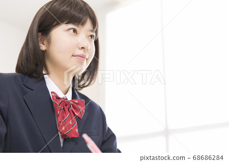 Female high school students studying 68686284