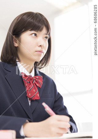 Female high school students studying Female high school students studying 68686285
