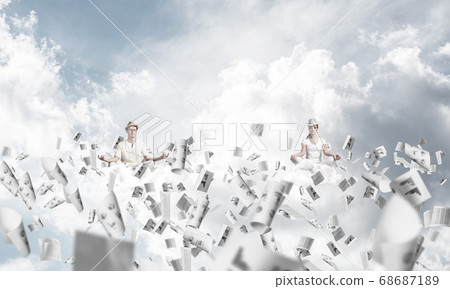 Young couple keeping mind conscious. Young couple keeping mind conscious. 68687189