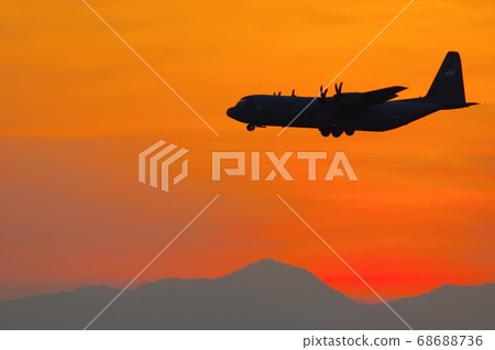 C-130 Hercules training at Yokota Air Base during the evening 68688736