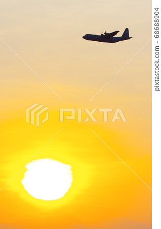 C-130 Hercules training at Yokota Air Base during the evening 68688904