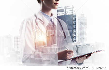 Confident medical industry employee Confident medical industry employee 68689233