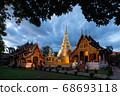 Golden pagoda in Phra Singh temple 68693118