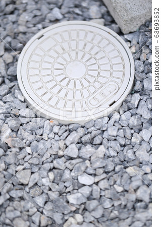 Paving stones and rain cover on the exterior of a house 68693852