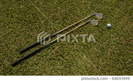 The background. golf clubs and balls The background. golf clubs and balls 68693949