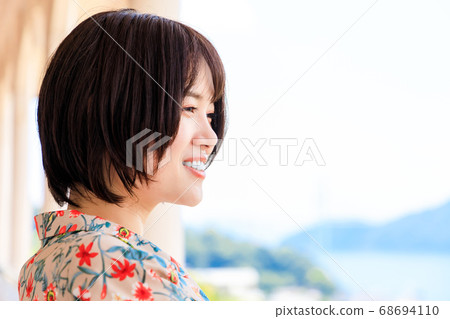 A young woman sightseeing in Nagasaki A young woman sightseeing in Nagasaki 68694110
