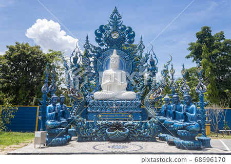 White Buddha Statue on Stone Base and Blue Five Follower 68696170