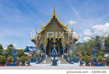 Blue Yellow Thai Church and Serpent or Naga in Wat Rong Sues Ten Temple on Front View Blue Yellow Thai Church and Serpent or Naga in Wat Rong Sues Ten Temple on Front View 68696186