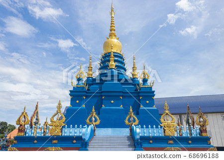 Blue Yellow Pagoda or Stupa in Wat Rong Suea Ten at Chiangrai Thailand 68696188