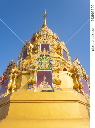 Gold Pagoda or Stupa on Blue Sky Background in Wat Phra Nang Din in Portrait View 68696201