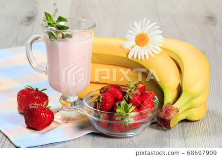 Glass of yogurt with mint and fresh strawberries, Glass of yogurt with mint and fresh strawberries, 68697909