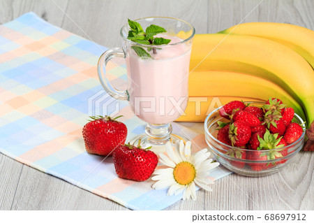Glass of yogurt with mint and fresh strawberries, Glass of yogurt with mint and fresh strawberries, 68697912