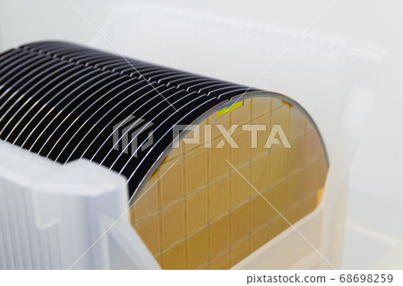 Close up of Silicon wafers gold yellow color with Close up of Silicon wafers gold yellow color with 68698259