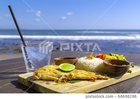 Fresh lunch in a beautiful location with sea Fresh lunch in a beautiful location with sea 68698286