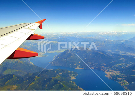 View from airplane window on the sea and 68698510
