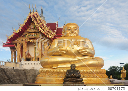 Golden Sitting Buddha Statue (Katyayana) at Wat Pa Golden Sitting Buddha Statue (Katyayana) at Wat Pa 68701175