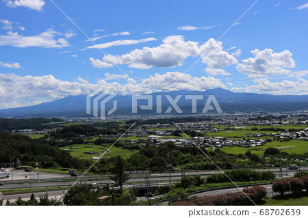 Joshinetsu Expressway Sakudaira parking area Yatsugatake mountain range seen from the highway oasis 68702639