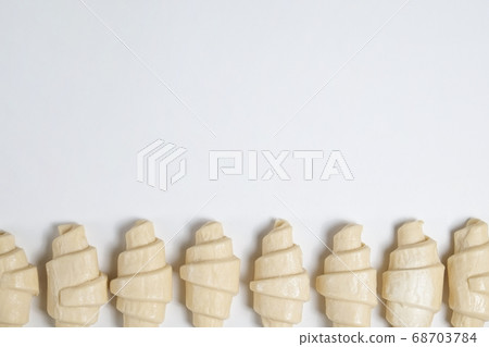 Buttery flaky viennoiserie pastry made of 68703784