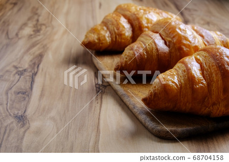 Buttery flaky viennoiserie pastry made of 68704158