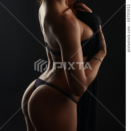 Erotica. Sensual pretty woman posing in studio Erotica. Sensual pretty woman posing in studio 68705013