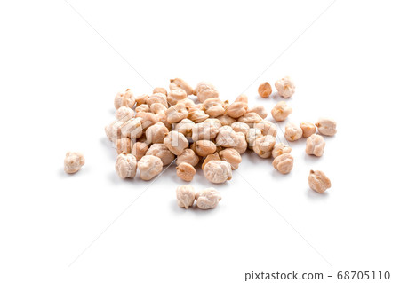 Isolated heap of raw uncooked chickpeas Isolated heap of raw uncooked chickpeas 68705110