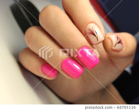stylish design of manicure on beautiful nails stylish design of manicure on beautiful nails 68705116
