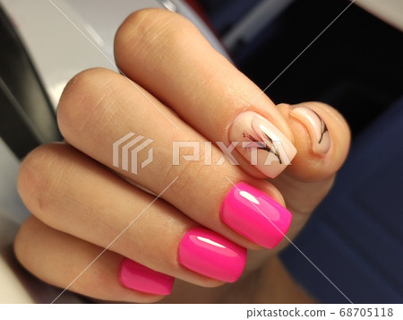 sexy pink manicure on long beautiful nails 68705118