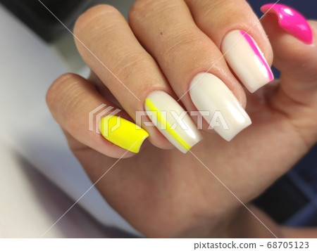 Amazing natural nails. Women's hands with clean manicure Amazing natural nails. Women's hands with clean manicure 68705123