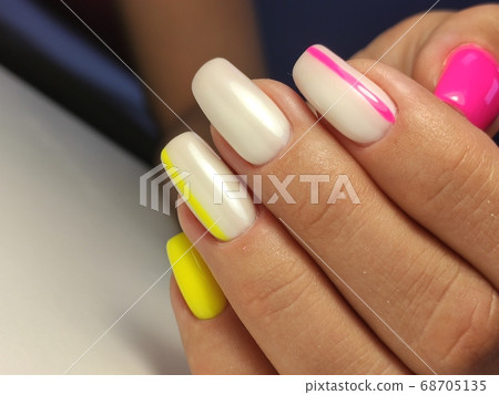 Amazing natural nails. Women's hands with clean manicure Amazing natural nails. Women's hands with clean manicure 68705135
