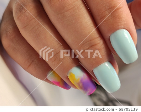 fashion manicure of nails on a beautiful background fashion manicure of nails on a beautiful background 68705139