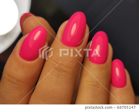 Amazing natural nails. Women's hands with clean manicure Amazing natural nails. Women's hands with clean manicure 68705147