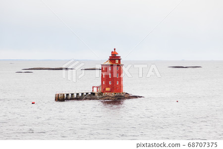 Kjeungskjaer Lighthouse is located in Bjungfjord, Norway. The lighthouse was built in 1880 and is the only octagonal lighthouse in Norway.	 68707375