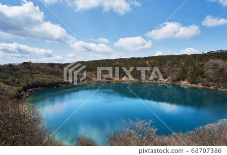 Beautiful lake. The immovable pond on the Ebino Highlands in Miyazaki Prefecture. Kirishima Kinko Bay National Park. Beautiful lake. The immovable pond on the Ebino Highlands in Miyazaki Prefecture. Kirishima Kinko Bay National Park. 68707386