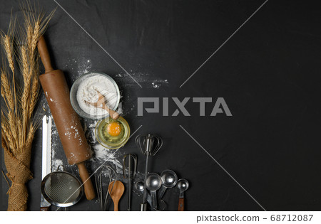 fresh eggs and cake flour with kitchen utensils fresh eggs and cake flour with kitchen utensils 68712087