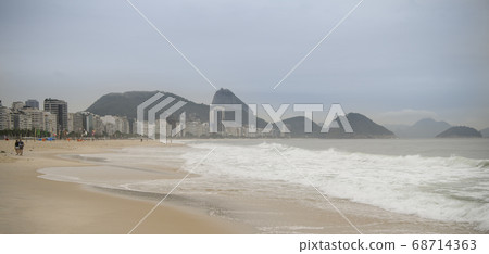 Ocean surf on the beach of Copacabana. Rio de Janeiro, February 2020 Ocean surf on the beach of Copacabana. Rio de Janeiro, February 2020 68714363